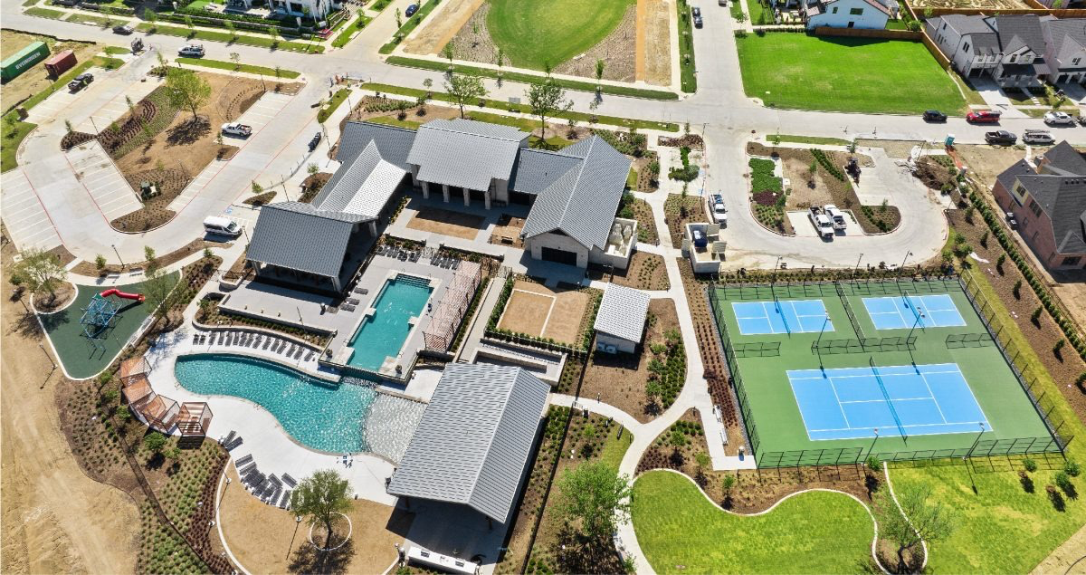 The Fields amenity center aerial view with pool and tennis courts